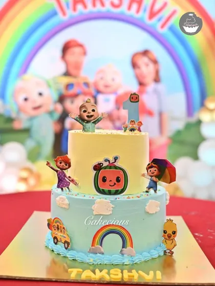Bringing the world of CoComelon to life with this colorful two-tier cake for a first birthday party. It’s decorated with all the favorite characters, making it a guaranteed hit with the little ones.