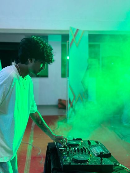 Kicking off the set at the college fest with a blast of green smoke. I always aim to start with high impact, setting the tone for the journey ahead.
