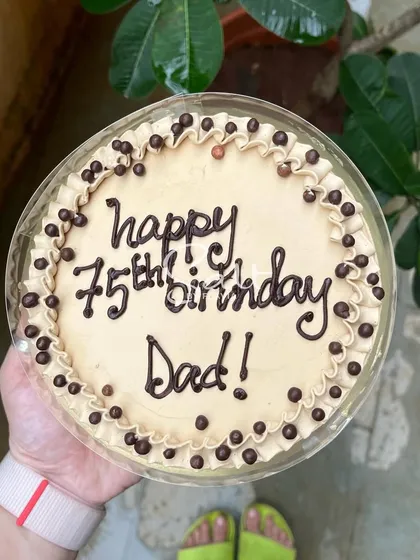 Introducing my new Irish Coffee cake. It's a rum and coffee-soaked chiffon sponge with a smooth coffee buttercream, perfect for a 75th birthday celebration.