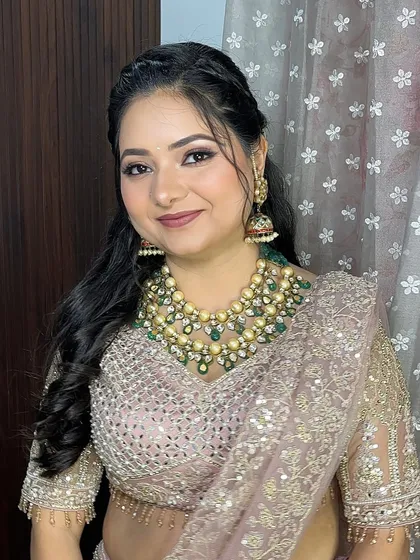I'm always up for a soft glam look. This client looks so elegant with her smokey brown eyes, nude lips, and a beautiful braided hairstyle for her engagement function.