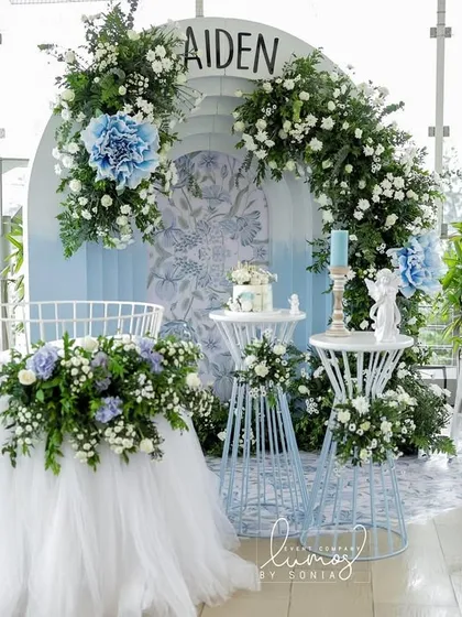 Welcoming a little blessing with serene elegance. This baptism decor, in shades of heavenly blue and pure white, creates a simple yet classy atmosphere for a deeply meaningful day.