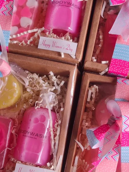 A vibrant and fun gift set for Women's Day, featuring heart and unicorn-themed soaps and a matching pink body wash.