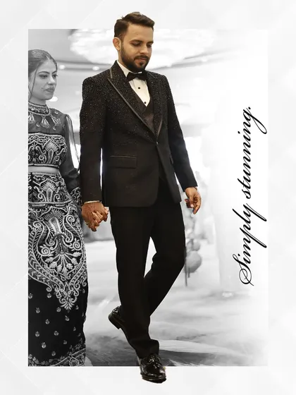 For the modern groom who walks with confidence. This bespoke tuxedo, featuring a textured jacket with satin lapels, is crafted to make your most important moments truly unforgettable. Every stitch tells a story of personal style.