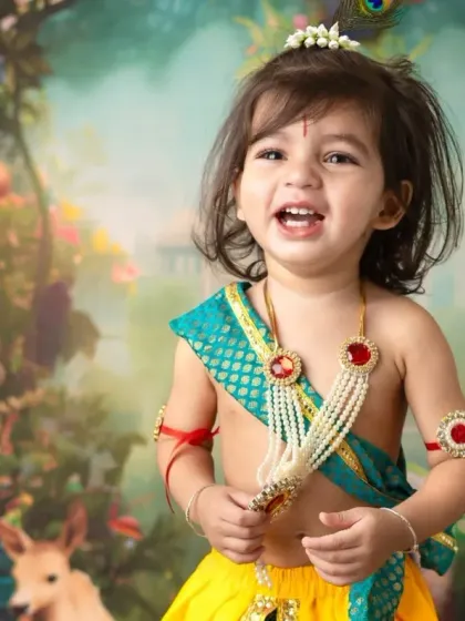 The pure, mischievous joy of little Krishna. I focus on capturing these natural, happy expressions that truly bring the character to life during our Janmashtami mini sessions.