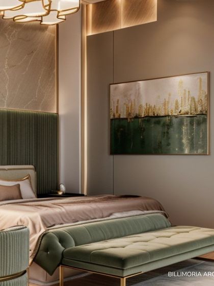 A serene bedroom where a tufted green velvet bench sits at the foot of the bed. The abstract artwork above pulls together the green and gold accents used throughout the room, creating a cohesive and artistic feel.