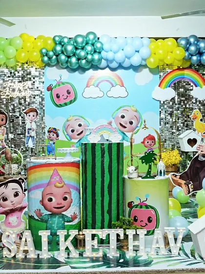 We brought the cheerful world of Cocomelon to life for Sai Kethav's first birthday. This vibrant setup includes a custom printed backdrop with all the favorite characters, personalised life-size cutouts of the birthday boy, and a colourful balloon garland to complete the fun look.