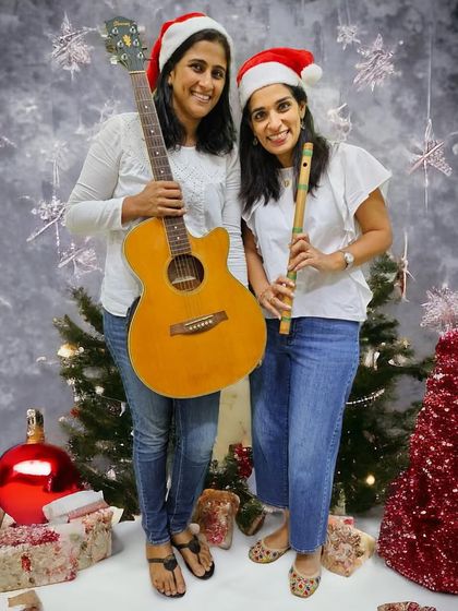 Here I am with our teacher Karen, ready for a Christmas music workshop. We love working together to bring interactive and fun musical experiences to schools and communities.