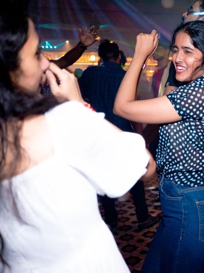 Friends dancing together and having the time of their lives. This is the vibe I strive for.
