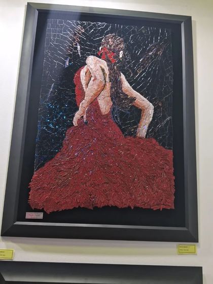 A mosaic of a flamenco dancer in a flowing red dress by Egyptian artist Nagla.
