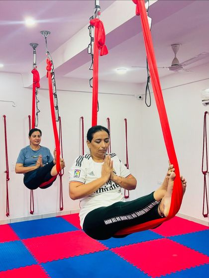 Finding a moment of peace while suspended in air is a unique experience. Our students practice meditative postures in the hammock, combining the benefits of mindfulness with gentle movement.