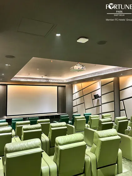 Here is a view of our 31-seat private theatre, facing the expansive 200-inch screen. The room is acoustically treated and features a state-of-the-art Dolby sound system, creating an environment where every scene is felt, not just seen.