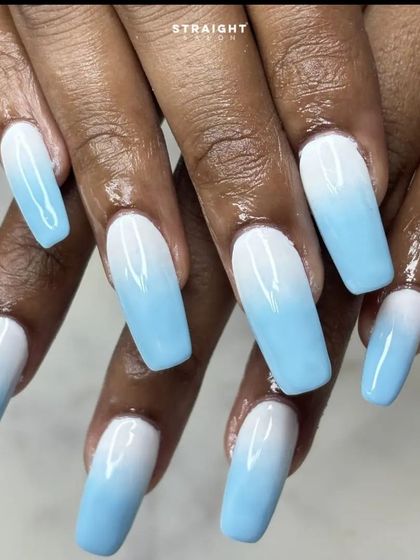 The full set of the blue and white ombre nails. It's a clean, crisp look that's perfect for summer or any time you want a pop of color.