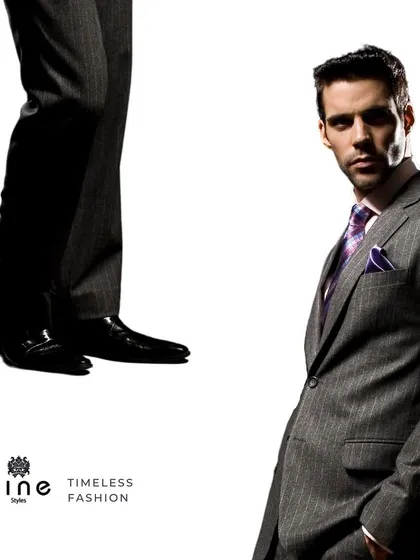 A pinstripe suit is a staple of power dressing. We ensure the tailoring is perfect, so you command attention in the most understated way.