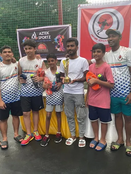 The Under 12 boys' winners celebrating with their trophy after a tough 3x3 tournament. A proud moment for the players, coaches, and parents.