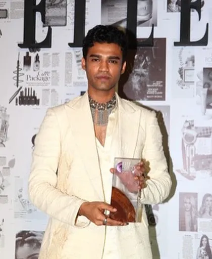 Actor Babil Khan with the custom-designed resin trophy at the Elle Beauty Awards. Seeing my art in the hands of such talented individuals was a dream come true.