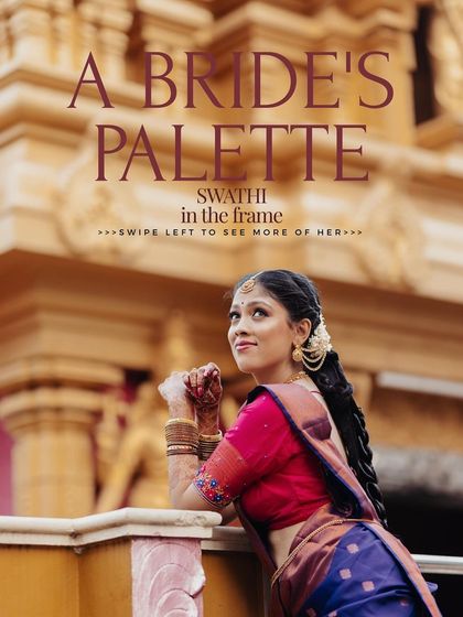 A beautiful portrait of a bride in a traditional blue and pink saree, posing against the backdrop of a temple.