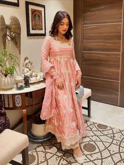 For Ganpati celebrations, I styled Bhumi Pednekar in this lovely pink anarkali suit. The delicate white embroidery and soft fabric make it a comfortable yet festive choice for a day of celebrations.