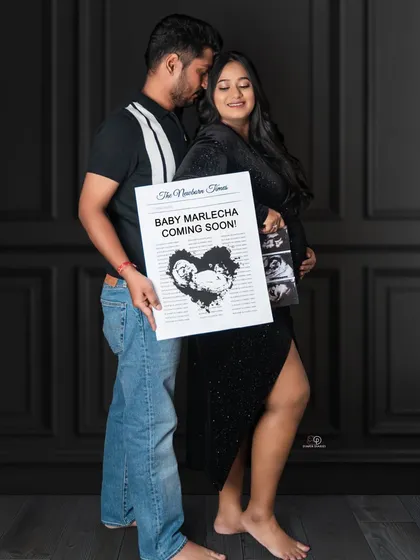 Extra! Extra! Read all about it! Using fun props like a custom newspaper and ultrasound scans makes for a creative and memorable baby announcement during your couple's maternity session.