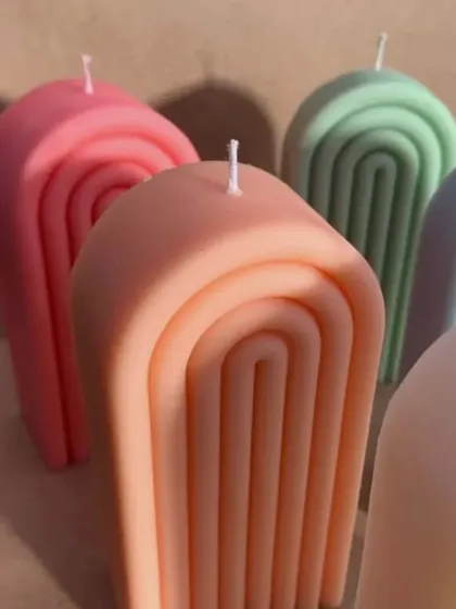 A collection of our arch candles in various pastel shades. They are a perfect decor piece or gift.