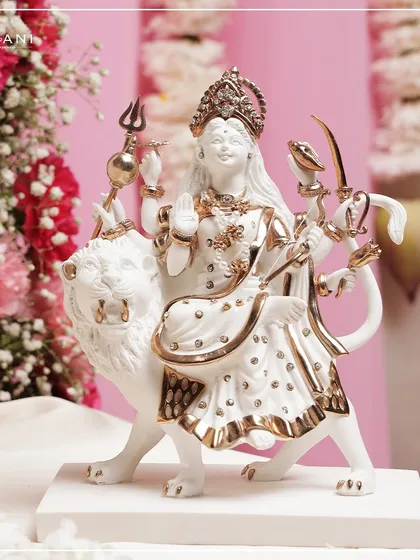 From my Devaarya Collection, I present the divine presence of Mata Rani in exquisite white and gold porcelain. This moorti is a symbol of grace, strength, and serene devotion, designed to bring blessings and profound beauty to your home.