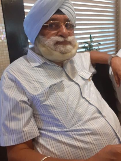 A cherished photograph of my father. He was my inspiration and role model, and his absence is deeply felt, especially during moments of professional celebration. I miss you, Dad.