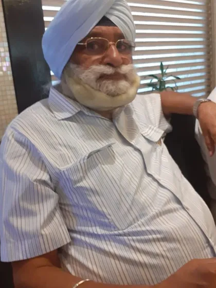 A cherished photograph of my father. He was my inspiration and role model, and his absence is deeply felt, especially during moments of professional celebration. I miss you, Dad.