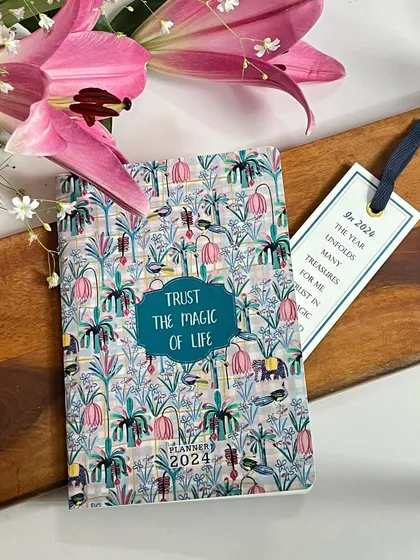 This 2024 pocket planner features our 'Magic of Life' design. It’s a little reminder to trust in the journey as you plan your days.