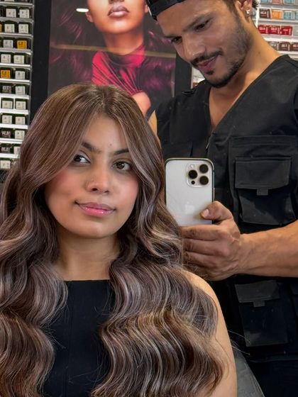 An icy blonde transformation in progress. Here I am styling the hair to show off the cool, multi-tonal blonde shades we achieved.