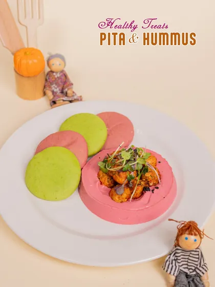 A healthy and colorful treat! Our beet-infused hummus with soft, vibrant pita bread is a delicious way to sneak some veggies into your kiddo's party meal.