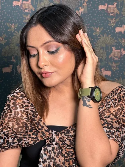 A close-up on the eye makeup. The soft pink and brown tones are universally flattering and create a romantic, dreamy effect.