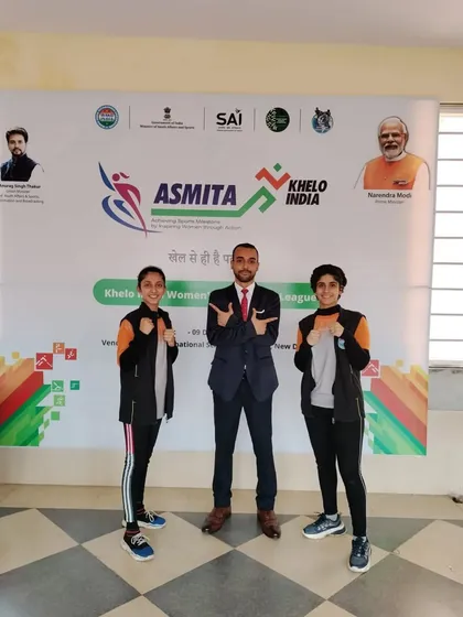 Pointing to the champions. These young women are the future of Indian kickboxing.