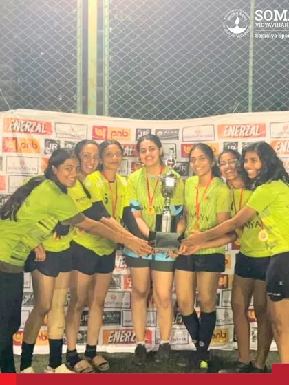 The victorious K. J. Somaiya Medical College & Research Centre women's team huddles together with their championship trophy.