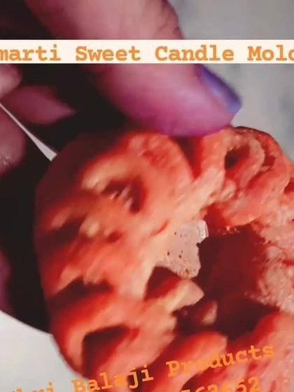 A close-up of a finished Imarti-shaped candle. The mold captures the intricate, syrupy swirls of the classic Indian sweet, making for a truly unique candle.