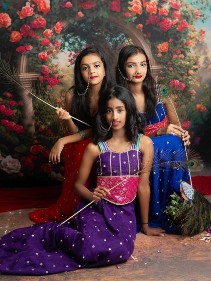 A modern take on a traditional theme. These girls bring a cool, "Gen Alpha" vibe to their Radha Rani inspired Janmashtami shoot.
