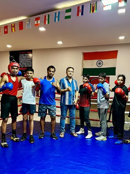 Our team of 6 boxers with their coaches, ready to head to the State Boxing Championship. We stand together as a team.