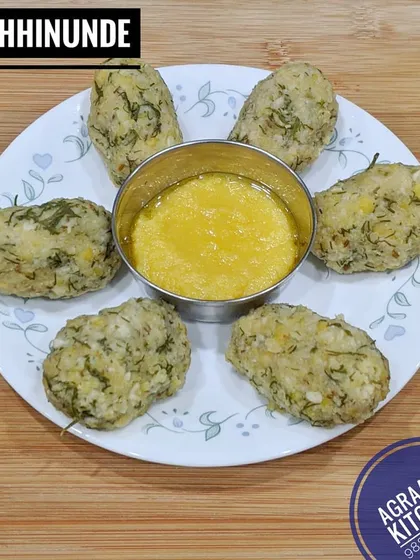 This is Nuchhinunde, a traditional and protein-rich steamed snack from Karnataka. Made with lentils and herbs, it is best enjoyed with a spoonful of pure, homemade ghee. It's a healthy and unique item on my menu.