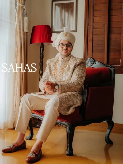 A classic portrait of the groom, Sahas, looking relaxed and happy. Capturing these quiet, confident moments before the ceremony is key to telling the whole story.