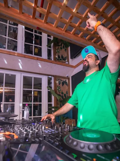 In my element, commanding the dance floor. This is me at Monkey Bar, making sure every single person is feeling the beat. It's more than just playing music; it's about creating a connection.