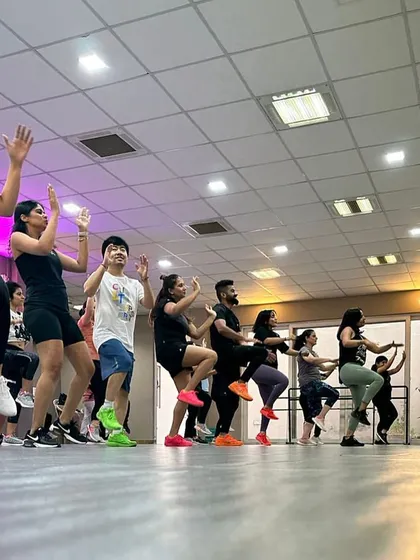 Feel the burn with these high-knee steps! This move is great for cardio and building lower body strength, all while dancing to an awesome beat.