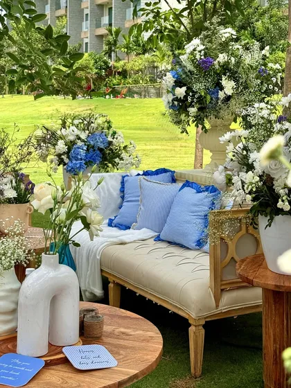 This collection of images provides a deeper look into my blue and white themed events. You will find details like custom stationery, floral-filled fountains, elegant table settings with blue pottery, and beautifully styled lounge areas, all showcasing a timeless and sophisticated design approach.