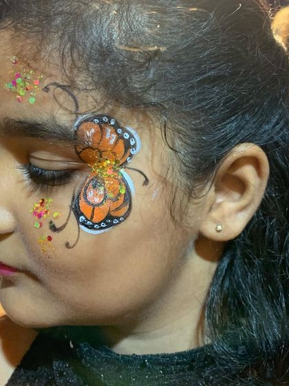 Whimsical Face & Body Art photo 24