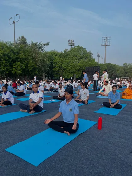 Finding stillness amidst the crowd. I guide large groups through meditation and pranayama, helping participants quiet their minds and improve focus, a crucial skill in today's fast-paced corporate world.