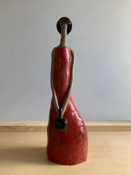 Meet the 'Damn Red Woman,' a powerful ceramic sculpture created by one of our students. It’s a story of resilience, strength, and the beauty found in imperfection.