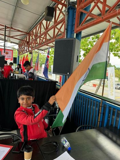 One of our youngest drivers proudly holding the Indian flag at his debut in the Asia Max Trophy in Langkawi, Malaysia. We are honored to represent our country abroad.