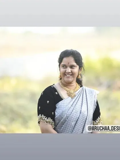 A happy client, Yogini, in her custom black velvet blouse. The subtle zardosi work on the sleeves adds a touch of richness and enhances the beauty of her simple yet elegant saree.