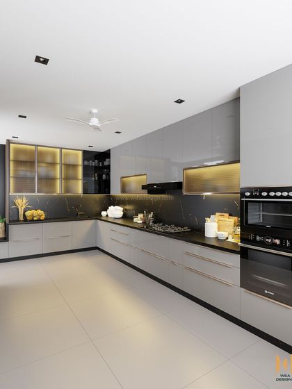 A spacious luxury kitchen featuring premium acrylic glass cabinets in grey, a black marble backsplash, and a large built-in oven unit.