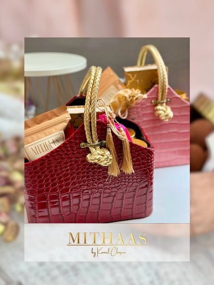 My collection includes a variety of packaging styles, like these chic tote baskets in deep red and soft pink. They are perfect for creating custom hampers for birthdays, bridal showers, or just because.