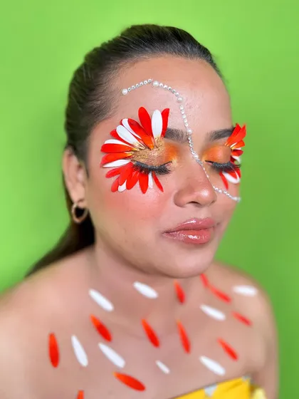 A beautiful shot of the floral makeup with eyes closed, showing the blend of colors and textures.