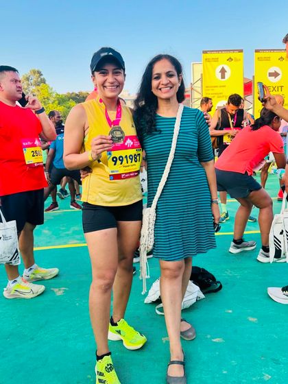 With my nutritionist after the TCS10K. Proper fueling is a critical component of performance, and her guidance was key to my success.