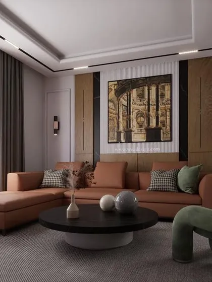 A modern living room design for a project in JP Nagar, featuring a unique knotted green armchair, a comfortable chaise lounge, and textured wall panels for a sophisticated look.